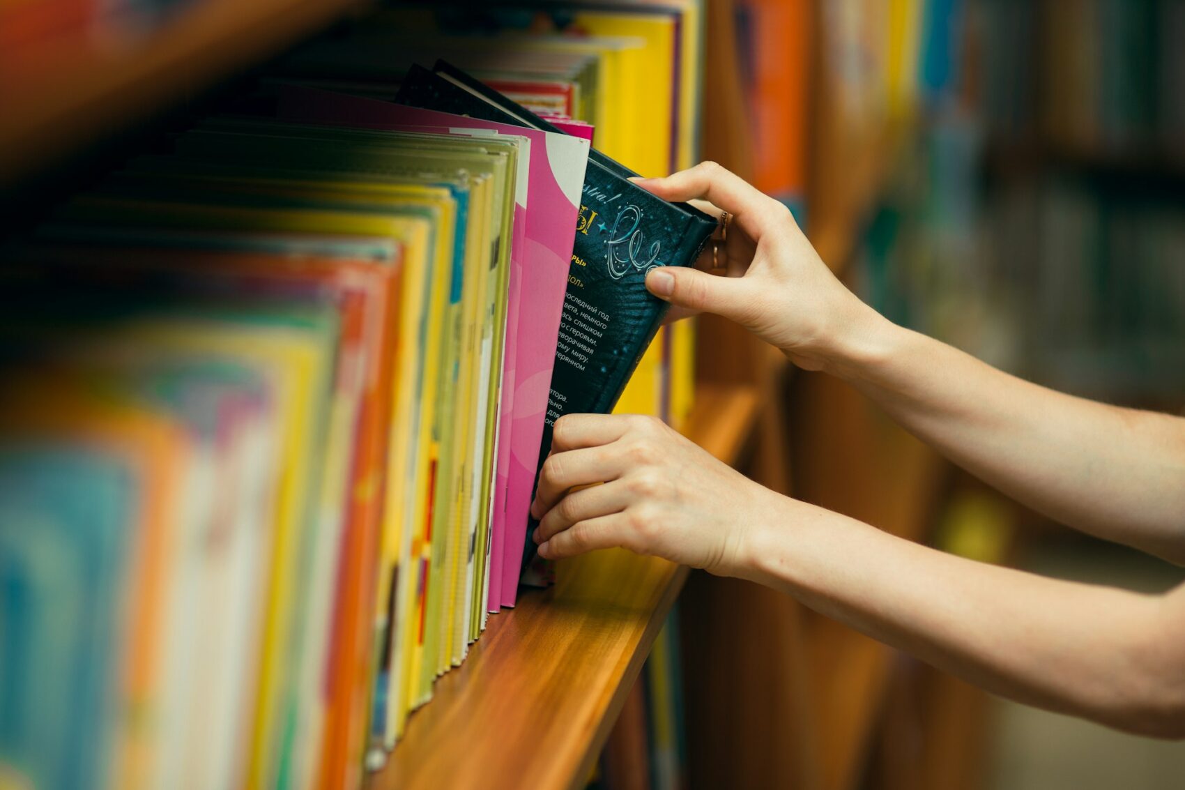 A student reads a book in the library